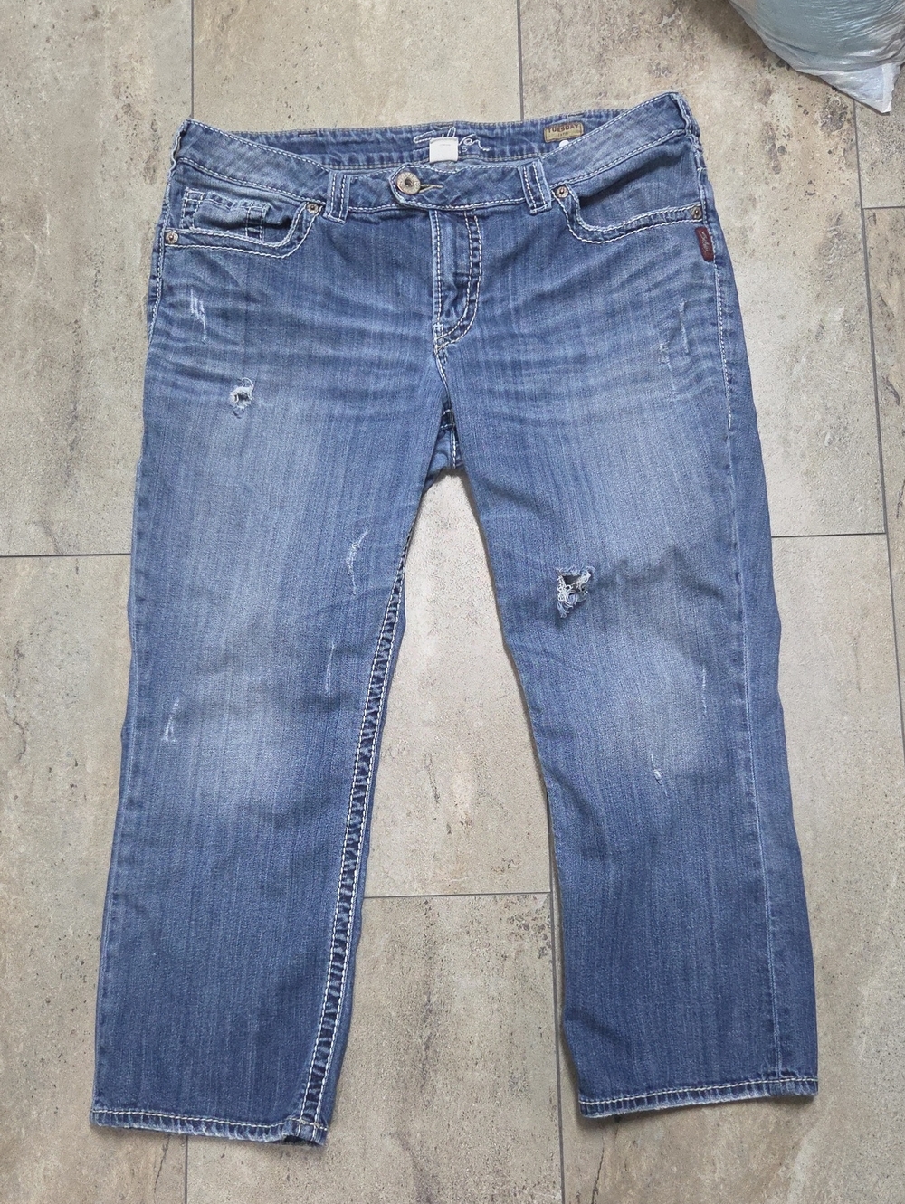 - Silver Jeans Women’s Light Blue Distressed Boyfriend Jeans